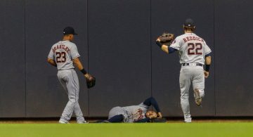 Astros All-Star George Springer carted off after colliding with wall