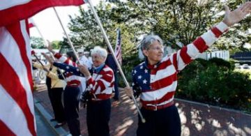 'Freeport flag ladies' wave Stars and Stripes one final time