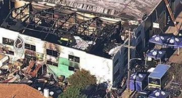 Jury acquits 1, hung on 2nd in warehouse fire