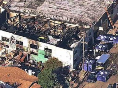 Jury acquits 1, hung on 2nd in warehouse fire