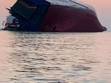 Noises heard as Coast Guard searches for 4 inside cargo ship