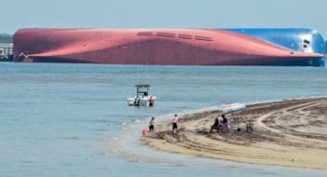 The Latest: Coast Guard: 4th crew member rescued from ship